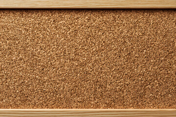 Brown corkboard texture with wooden frame