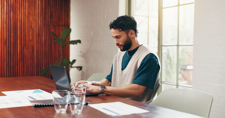 Laptop, typing and business man in office with chart for social media analytics, research or data. Computer, creative and engagement analyst working on metrics, forecast trends and website traffic