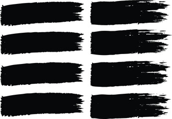 Set of eight black grunge brush strokes on transparent background