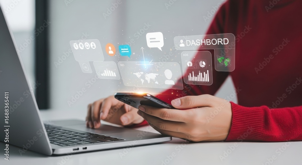 Poster business professional analyzing digital data on a futuristic dashboard with a smartphone and compute