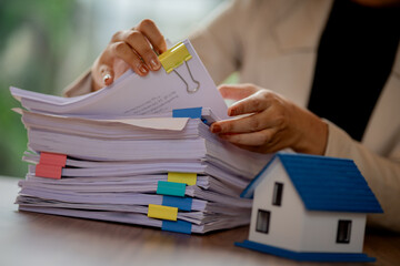 Smiling business professionals in office, embracing teamwork and leadership, celebrating success with confidence, cooperation, happiness, and positive workplace community atmosphere.
