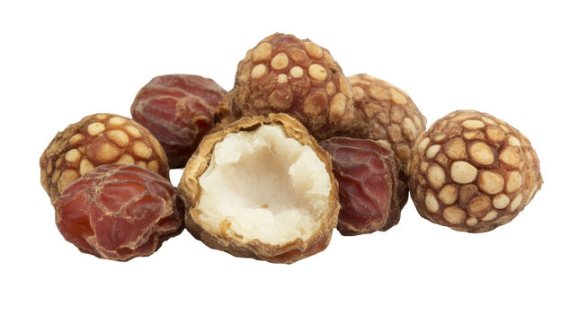 Dried Chinese Red Dates Revealing Ivory Center Surrounded by Whole Fruits on Transparent Background