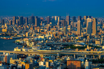 sunset or sun rise of  Osaka cityscape with Skyline and office building and downtown of Osaka with twilight sky in summer season, Osaka city, Japan