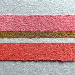 Textured paper strip with horizontal bands of pink, gold, and white