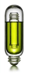 A clear glass capsule holds a smaller, sealed glass cylinder filled with bright yellowish-green liquid