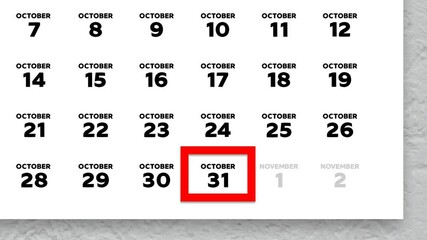 The date October 31th marked with a red cursor on the wall calendar 2025