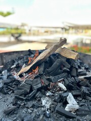 Beef ribs cooking over open fire