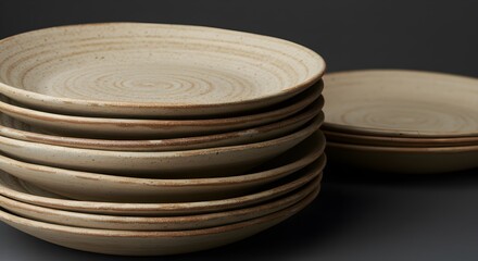 Obraz premium Stack of beige ceramic plates