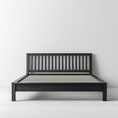 A dark-stained wooden platform bed with a slatted headboard against a white wall.  Simple, minimalist design