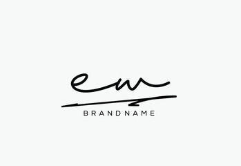 EW letter elegant cursive beauty handwriting logo.