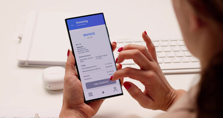 Smartphone Invoice: Financial Advisor Close-Up Working