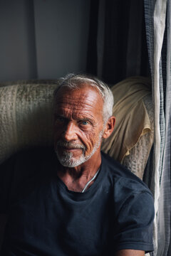 portrait of a old meen with a deep gaze