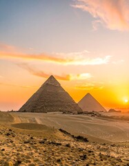 Sunset over ancient pyramids in desert