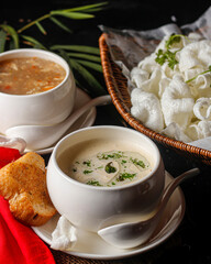 Cream Soup and Hot Soup Served with Crackers in Basket