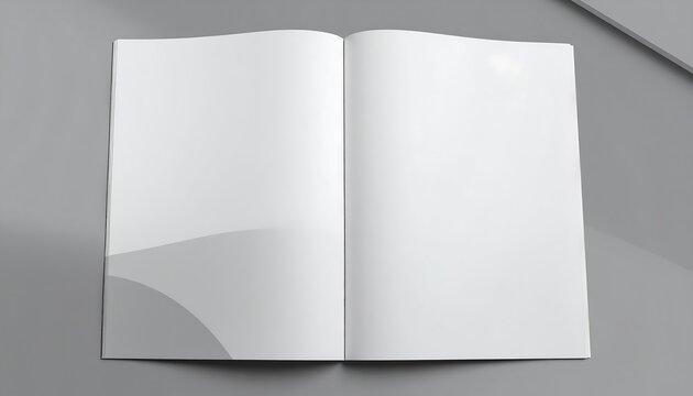 Open blank notebook on a smooth gray surface