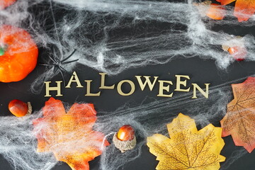 Halloween Lettering with Autumn Leaves, Cobweb, and Spider