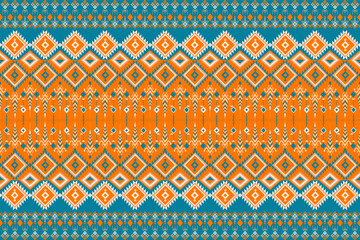 Colorful tribal geometric seamless pattern with ethnic motifs in orange and teal tones. Perfect for textile, wallpaper, decoration, fashion, and cultural design projects.