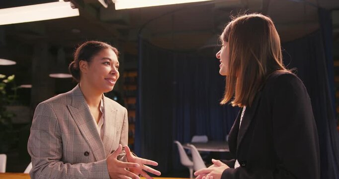 Successful businesswomen discuss excellent results of work
