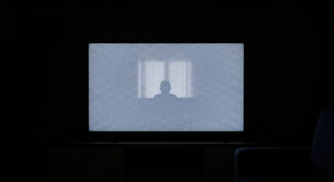 Silhouette of a person on a static TV screen in a dark room. Horror concept representing fear, nightmares and mental disorders. - Powered by Adobe