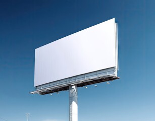 A large, blank billboard stands against a vibrant blue sky, its metallic frame visible.  The billboard's surface is bright white, ready for advertisement.  Low angle shot