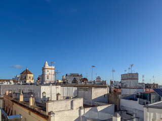 Cadiz, Spain - April 16, 2025: Streets of the historic center of Cadiz during the Holy Week festivities in Cadiz, Spain