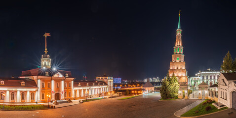 Obraz premium The ancient leaning red brick Syuyumbike Tower at night on the territory of the Kazan Kremlin. Russia