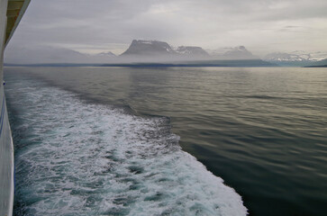 Beautiful nature landscape scenery of Iceland coast with cruiseship cruise ship liner sailing...