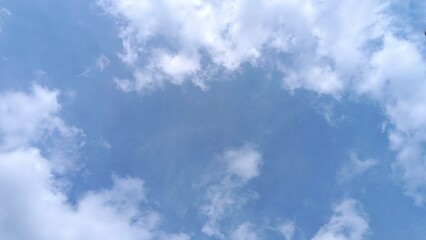 Stunning blue sky background with open air view of cloudscape. 
