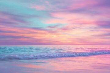 Obraz premium Pastel sunset over tranquil ocean. Soft hues of pink, teal, and golden light paint the sky and water