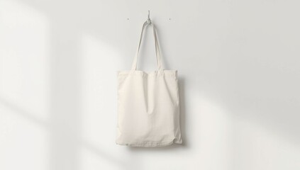 Blank Canvas Tote Bag Hanging on White Wall