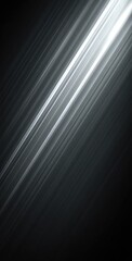 Obraz premium Abstract streaks of white-silver light diagonally traversing a dark gradient background, creating a sense of speed and ethereal glow
