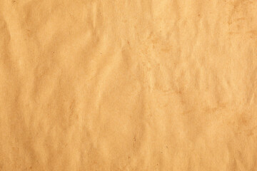 Crumpled craft brown paper with slight visible stains