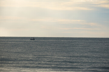 fishing boat at sunset