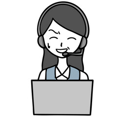 苦笑いしているコールセンターの女性