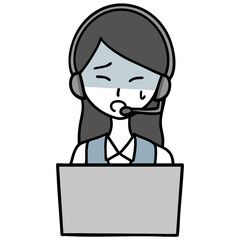 必死に対応するコールセンターの女性