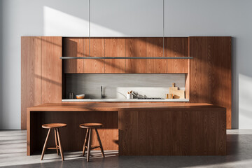 Modern wooden kitchen interior with minimalist island and natural lighting in contemporary architectural space. 3D Rendering
