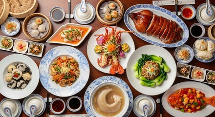 Top view of a lavish and diverse Chinese food banquet featuring a rich assortment of traditional celebratory dishes , plate styled for restaurant, advertising, and culinary magazine use
