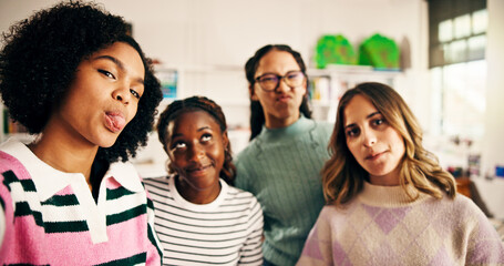 Selfie, students and funny face with girls in classroom for social media post, study group and picture. Education, photography and high school memory with teenagers on campus for friends and support