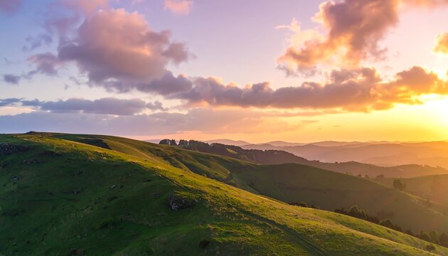 Scenic sunset over rolling green hills and valleys