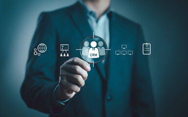 Business selecting CRM digital icon, symbolizing customer relationship management, marketing...