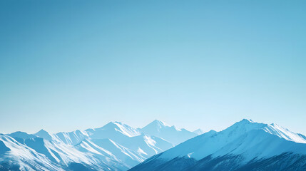 Fototapeta premium Majestic Snow-Capped Mountain Peaks Against Blue Sky - A Breathtaking Winter Landscape Adventure