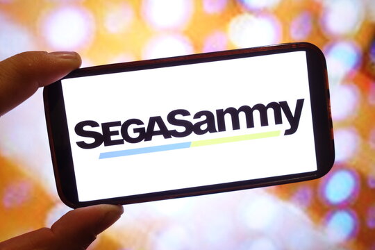 Konskie, Poland - June 20, 2025: Sega Sammy Holdings company logo displayed on mobile phone