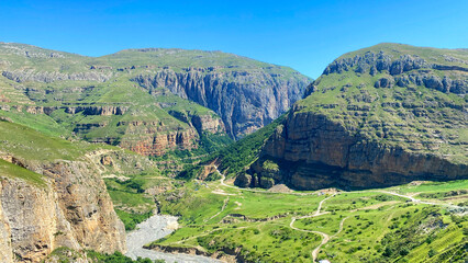 Majestic panorama of a green mountain valley in Azerbaijan. Travel and adventures. A picturesque...