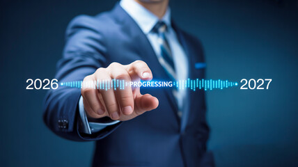 Businessman Pointing At Digital Progress Bar From 2026 To 2027 suit hand