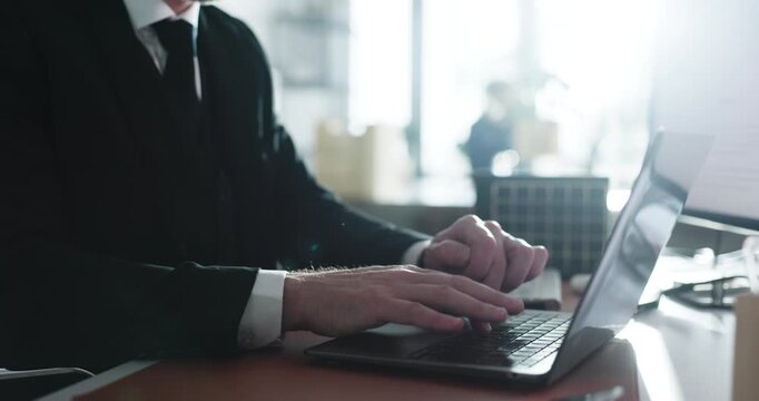 Typing, business and man in office with laptop, spreadsheet or budget planning for financial year. Email, contract and accountant in company with tech, finance and research for investment opportunity