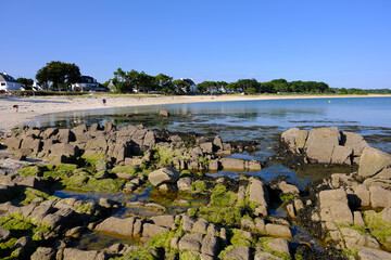 Rocky coast and beach at Carnac is a commune beside the Gulf of Morbihan on the south coast of Brittany in the Morbihan department in north-western France. 