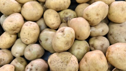 Full frame shot of baby potatoes at market stall. background