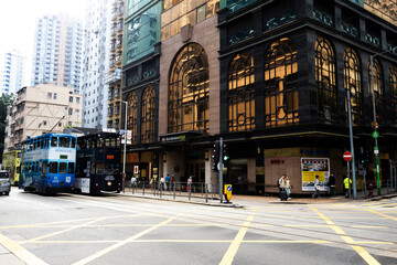 View landscape building skyscraper cityscape house of HongKong city and life lifestyle local chinese people walking on street with traffic light at traffic road on April 26, 2025 in Hong Kong, China