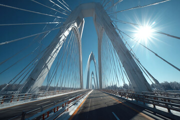Obraz premium Bright day on a modern suspension bridge showcasing technology and nature harmoniously