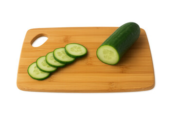 Sliced cucumber on wooden cutting board with transparent background